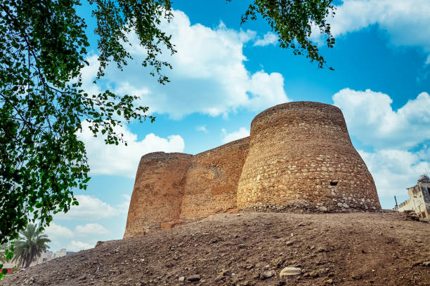 Tarout Castle, Qatif, Saudi Arabia. Tarout Castle, Qatif, Saudi Arabia in blue sky with clouds background. dammam stock pictures, royalty-free photos & images
