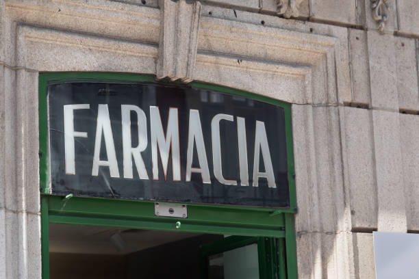 istock Old pharmacy front store sign in spanish 1266555833