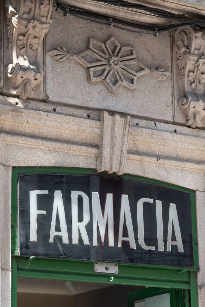 istock Old pharmacy frontstore sign in spanish 1266555834