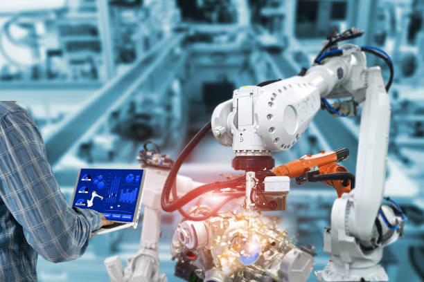 istock Manager engineer check control automation Robotic arms, industrial robots, factory automation machines 1266559172