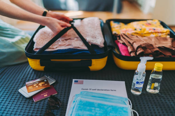 istock Packing suitcase for travel during COVID-19 1266559197