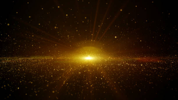 istock Abstract gold color digital particles flowing with dust and light background 1266559373