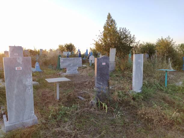 istock Old rural cemetery at sunset 1266561137