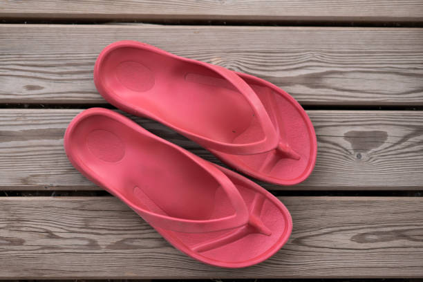 istock one pair of red flip flops 1266561432
