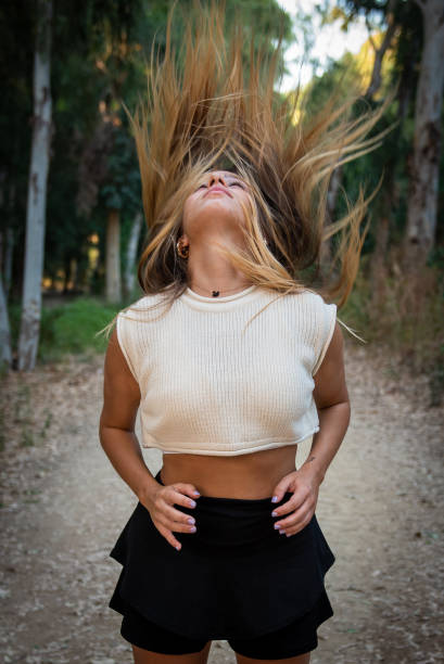 istock Young contemporary dancer and choreographer dancing outdoors Woman dancing in the environment. 1266562454