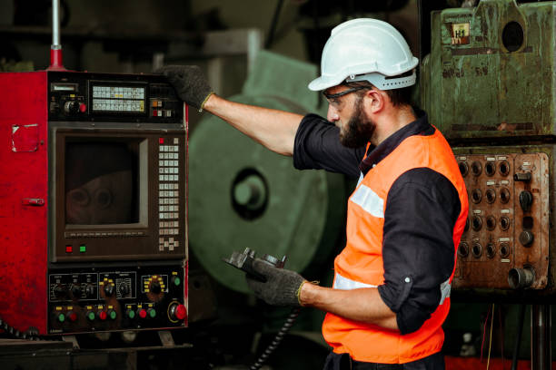 istock Man working in factory 1266563225