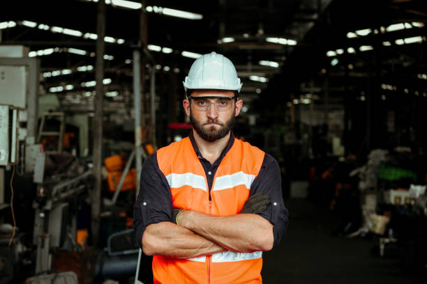 istock Man working in factory 1266563239