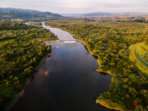 istock Beautiful Dunajec River in Poland. Green Forest and Blue Water. Drone view 1266564521