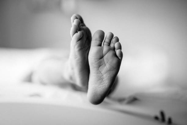 istock A close-up of tiny baby feet 1266566817