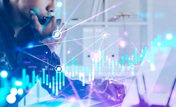 istock African trader in office, financial chart 1266567127