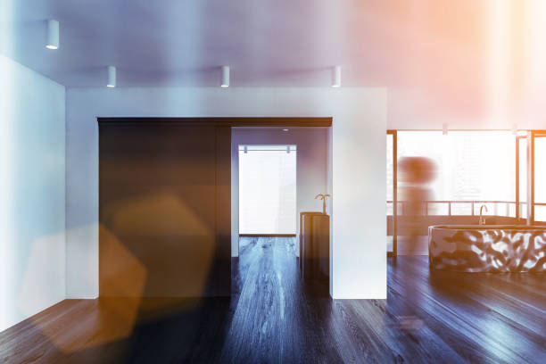 shadow cast on a wooden floor coming from a window. Texture and Silhouette for projects.