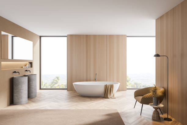 istock Wooden master bathroom with armchair 1266573437