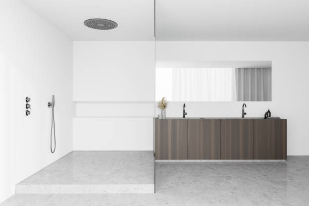 istock White bathroom with shower and sink 1266573710