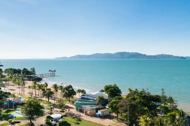 Townsville, Australia - June 19, 2019: View of Magnetic Island and the jetty on The Strand beach