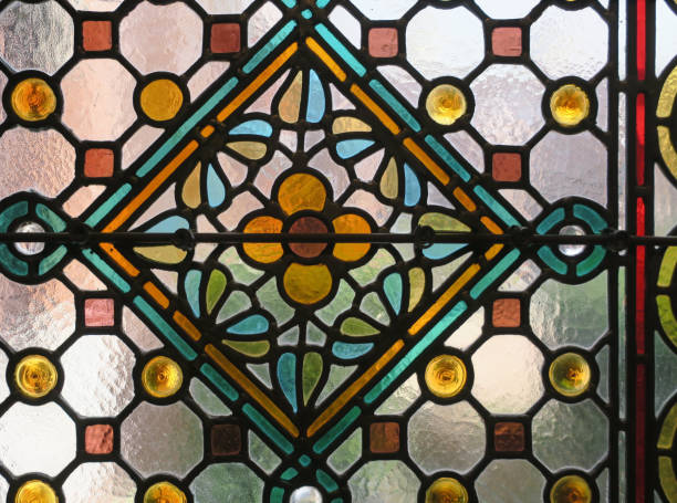 istock multicolored stained glass window with a flower pattern in a square 1266577010