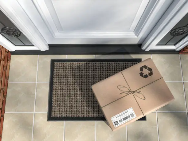 Photo of Express delivery, e-commerce online purchase concept. Parcel box on mat near front door.