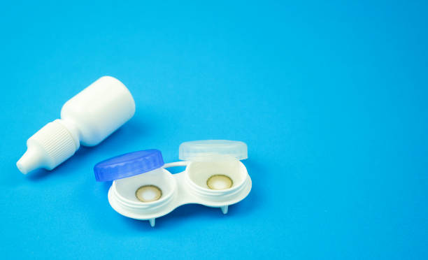 istock Contact lens on blue background 1266579570