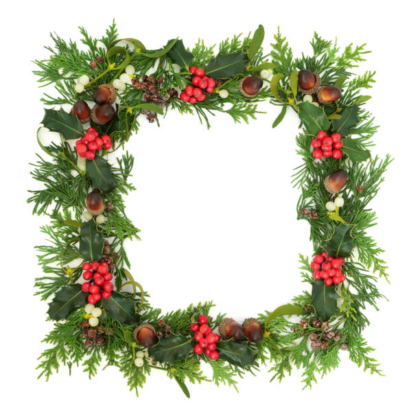 istock Traditional Winter Solstice Greenery Background Border 1266583862