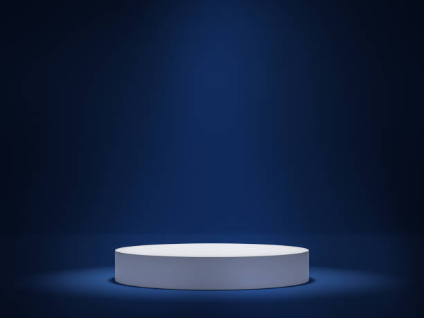 istock White cylinder podium on dark blue background 3d render 1266587041