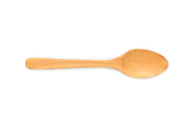 istock wooden spoon isolated on white background. 1266588114
