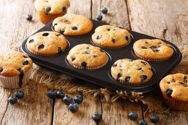 istock Rustic blueberry muffins close-up in a baking dish. Horizontal 1266588411