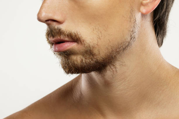 istock Unshaved man with a unkempt beard 1266589480