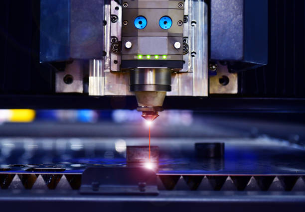 istock Industrial CNC laser cut machine while cutting the sheet metal 1266589867