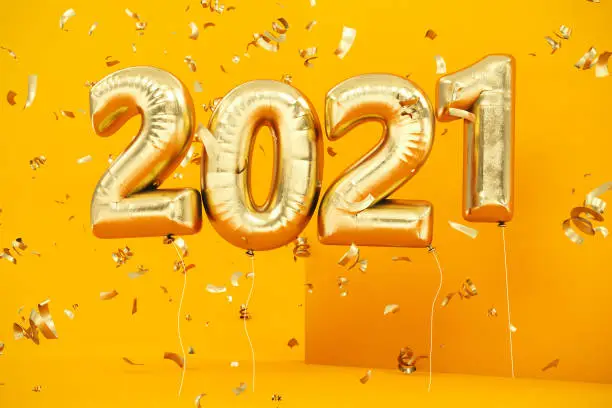 Photo of New Year Concept with Golden 2021 Balloons and Confetti on Yellow