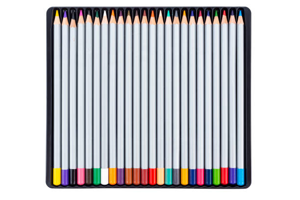 istock Color pencils in a box isolated on white background.Close up. 1266593953