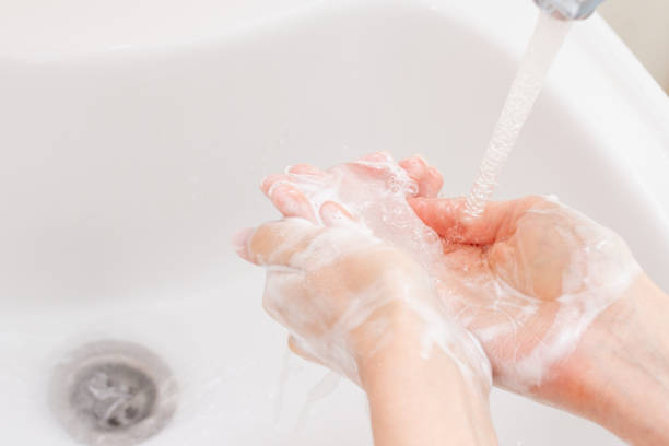 istock Washing hands with foam. Hygiene concept 1266599609