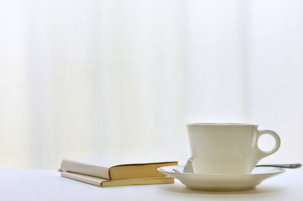 istock A Cup of Coffee & Books by the Window 1266600001