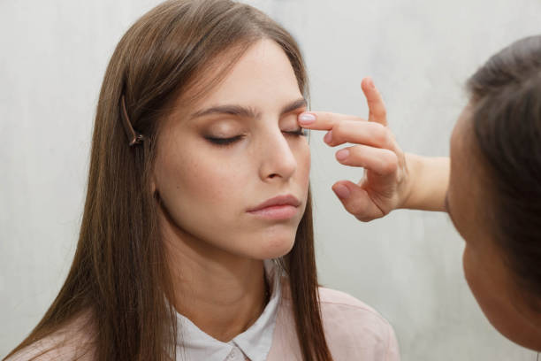 istock The process of removing excess tone cream. 1266605565
