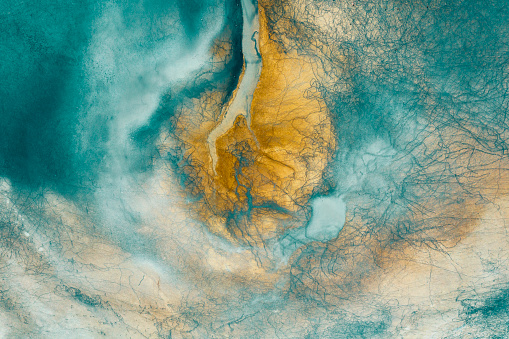 Aerial view of beautiful natural shapes and textures in lake. Taken via drone.