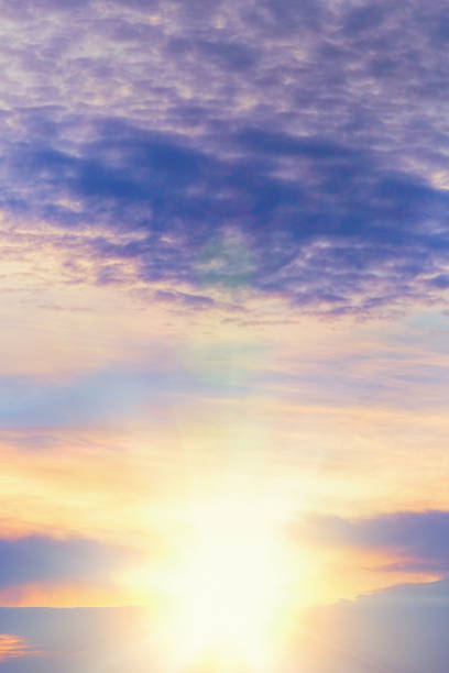 istock Glorious sunrise in a moody pastel sky with herringbone clouds 1266609600