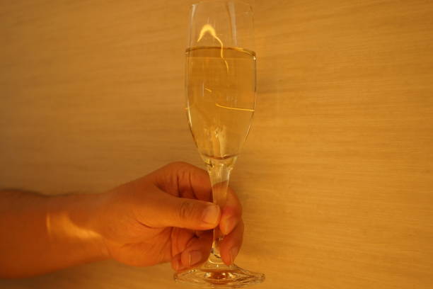 istock Toasting champagne glasses at party 1266612640