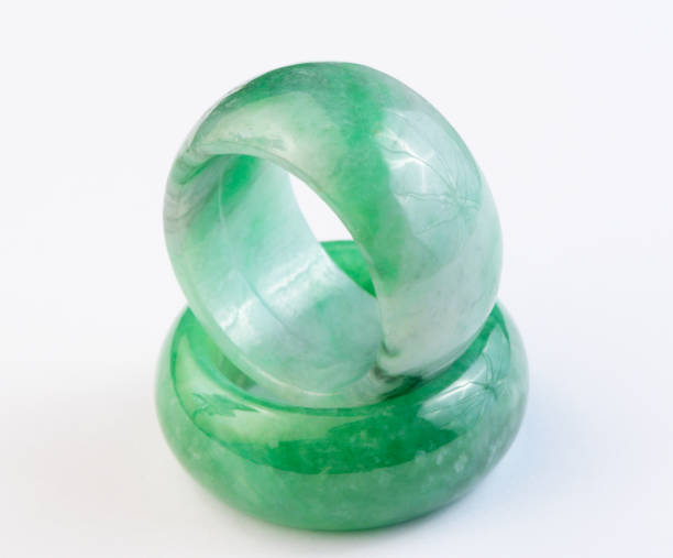 istock Group of green jade ring on white background 1266612817