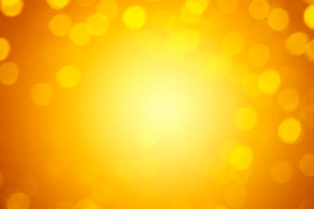 istock Abstract orange bokeh background. Abstract gold bokeh background. 1266616270