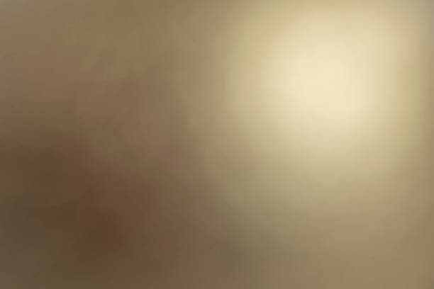 istock Soft background of bronze color light round gradient 1266618221
