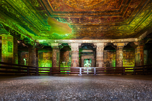 Buddha statue inside the Ajanta Caves, ancient buddhist caves near Aurangabad city in Maharashtra state of India
