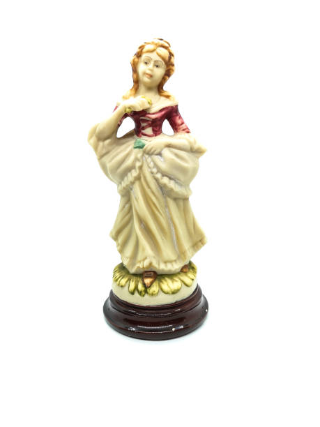 istock Ceramic figures of people on white background 1266626226