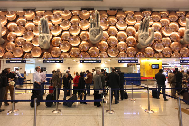 Indira Gandhi International Airport, New Delhi NEW DELHI, INDIA - FEBRUARY 12, 2014: Immigration area at the Indira Gandhi International Airport in New Delhi, India india airport stock pictures, royalty-free photos & images
