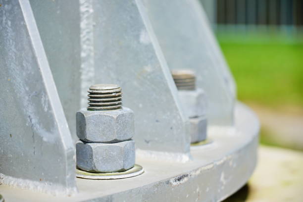 istock metal nut screwed onto a bolt 1266627481