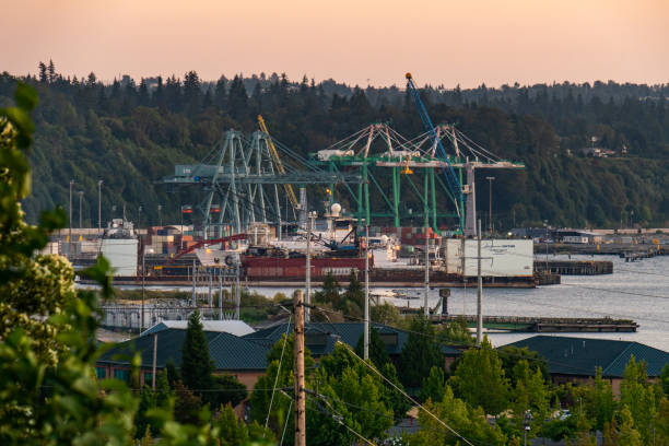 unset on Port Gardener includes Everett Port Docks Everett, WA. USA - 08/13/2020:  Sunset on Port Gardener includes Everett Port Docks everett washington state photos stock pictures, royalty-free photos & images