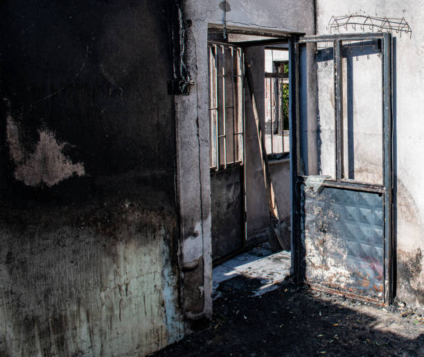 istock Burned down private wooden house outdoor park 1266630267