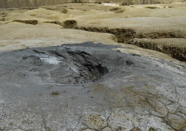 istock Mud geyser or mud volcano. Geological formation. particular hydrogeological conditions Generally all geyser field sites are located near active volcanic areas 1266630580