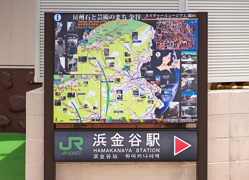 chiba, japan - july 18 2020: Information panel and illustration map of the Mount Nokogiri stone quarry in the Kanaya village known as the town of the Boshu stone and leading to the Hamakanaya station.