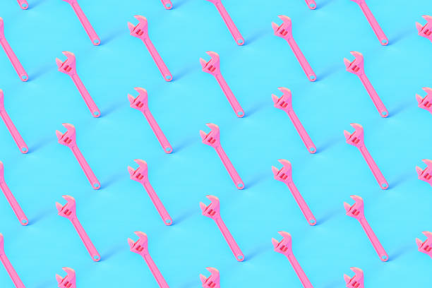 istock Seamless repetitive Wrench pattern on blue background 1266635031