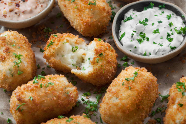 istock Creamy Mashed Potato Croquettes with Cheese and Sour Cream Dip 1266637074