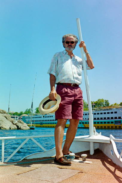 istock The nineties. A tourist cross the Nile by using the hotel's ferry boat. Aswan, Upper Egypt. 1266637607