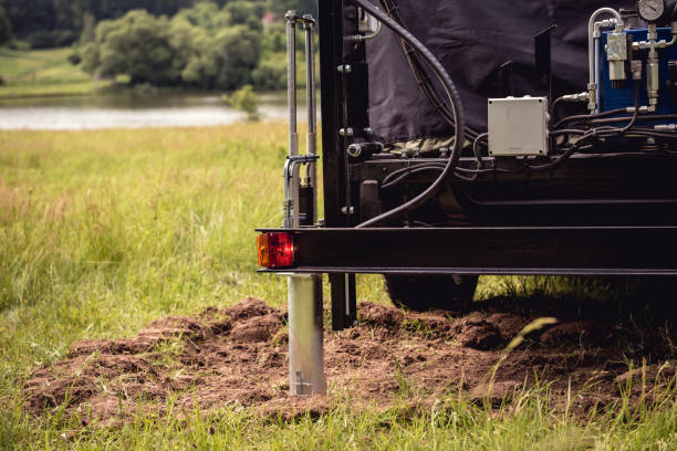 istock Soil examination. Collecting black soil on the field for examination 1266639421
